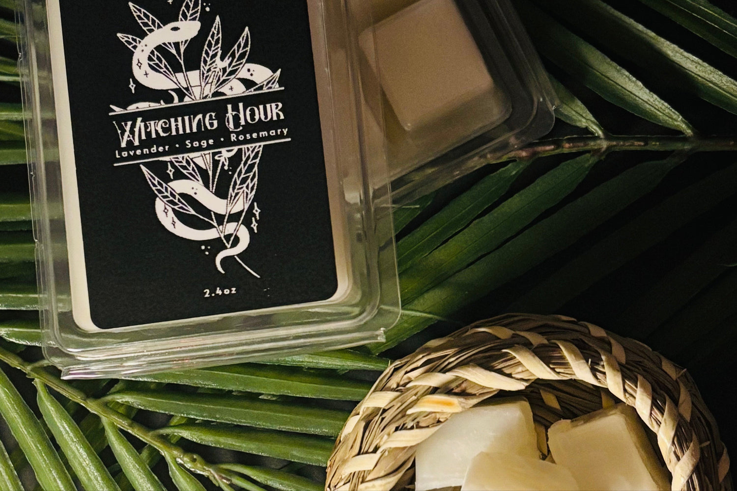 Wax melts in a clear container with a branded label on a dark background
